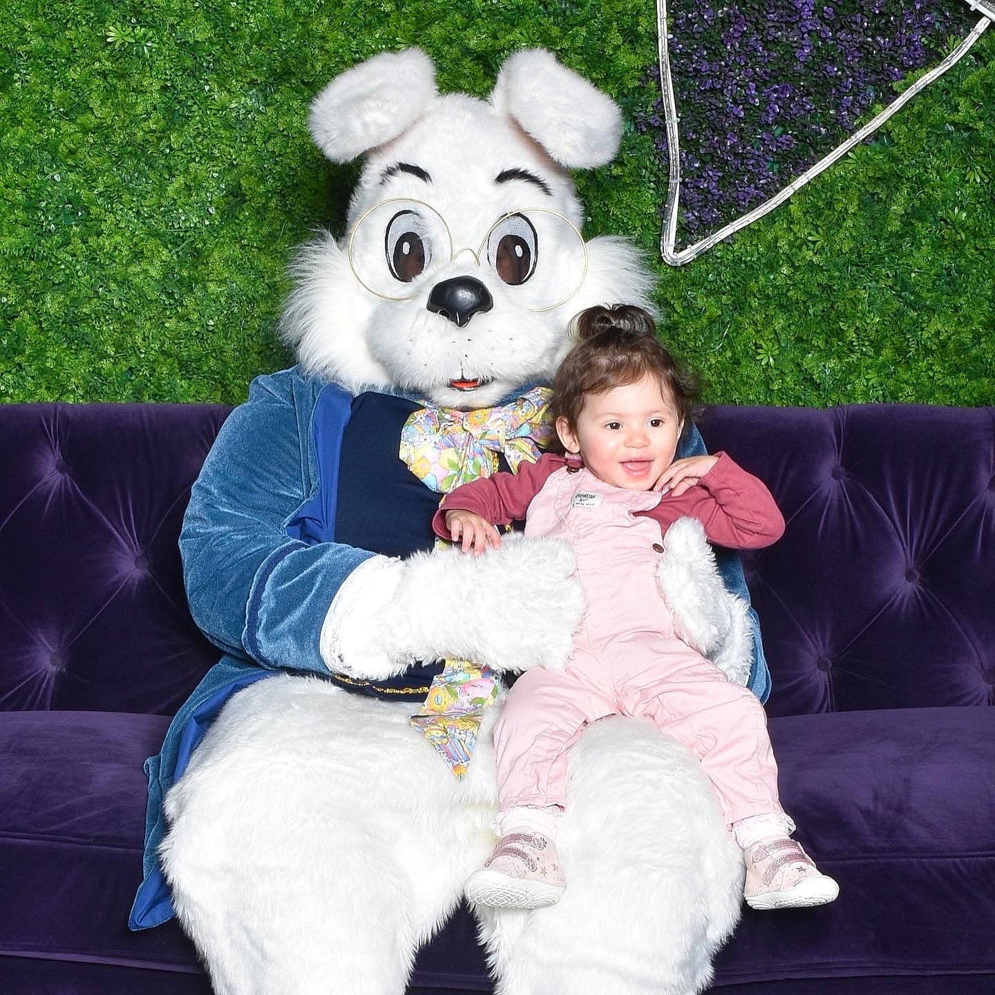 Skyler is registered to the contest to win money with this photo: baby_toddler_clothing, child, costume, easter_bunny, event, fun, fur, grass, happy, hat, head, holiday, lap, leisure, mascot, person, plush, rabbit, recreation, toddler