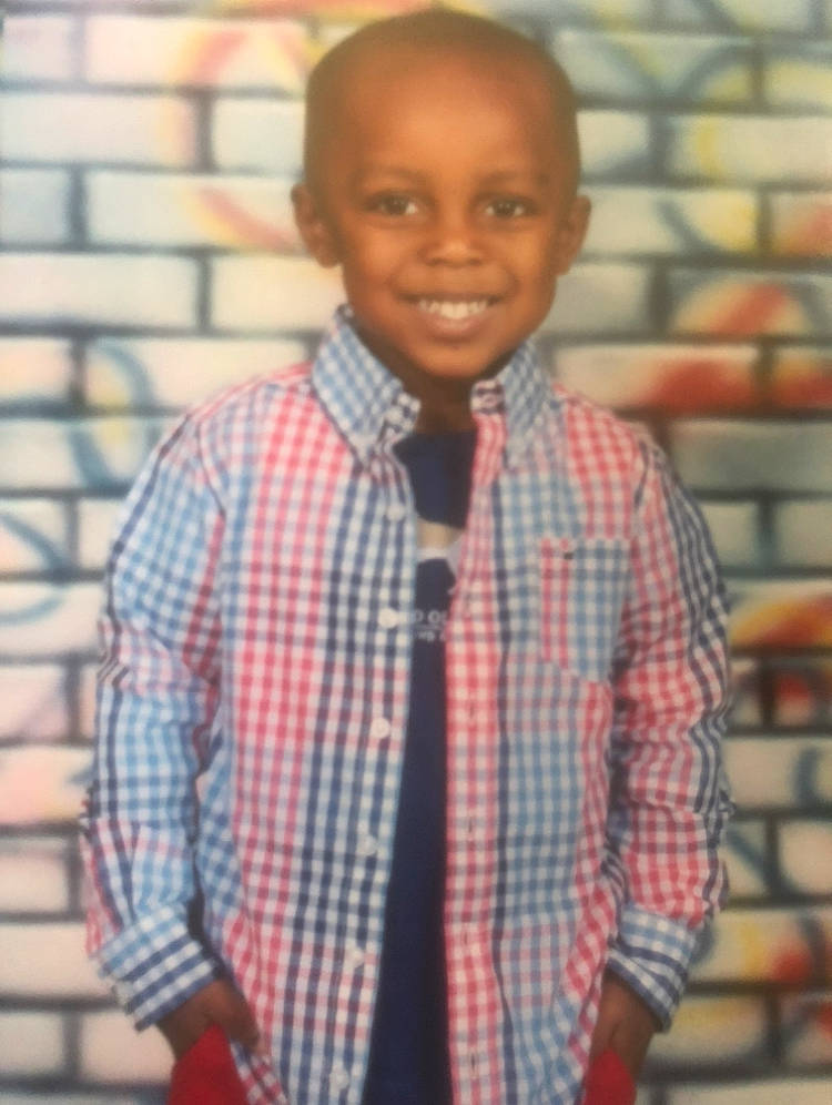 Aydin is registered to the contest to win money with this photo: child, child_model, design, dress_shirt, joy, outerwear, pattern, person, plaid, shirt, sleeve, smile, tartan, textile, toddler