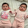 Ayda And Pera Twins joined the competition — help win amazing prizes! baby, babies, infant, child, twin, holding_hands, pacifier, pink_clothing, white_blanket, lying_down, cute, indoors, portrait, sleepwear, soft_lighting, two_children, young_child, face, head, peaceful