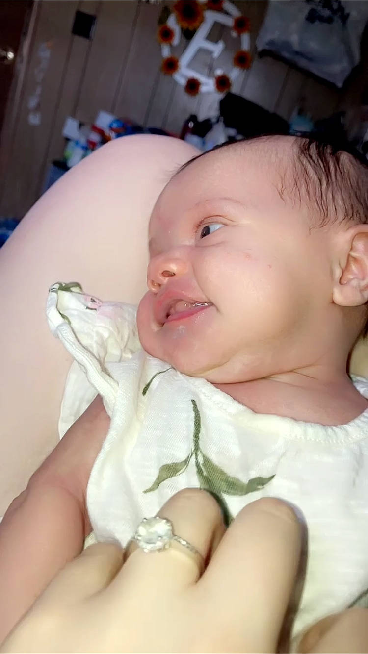 Kameryn joined the competition — help win amazing prizes! baby, baby_toddler_clothing, cheek, chin, comfort, dress, ear, eyebrow, eyelash, finger, gesture, hand, human_body, iris, lip, mouth, neck, nose, person, skin