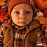 autumn, baby, beanie, child, clothing, cozy, eyes, face, fall, hat, indoors, jacket, leaves, photography, plaid, portrait, pumpkin, seasonal_decor, serious_expression, vest