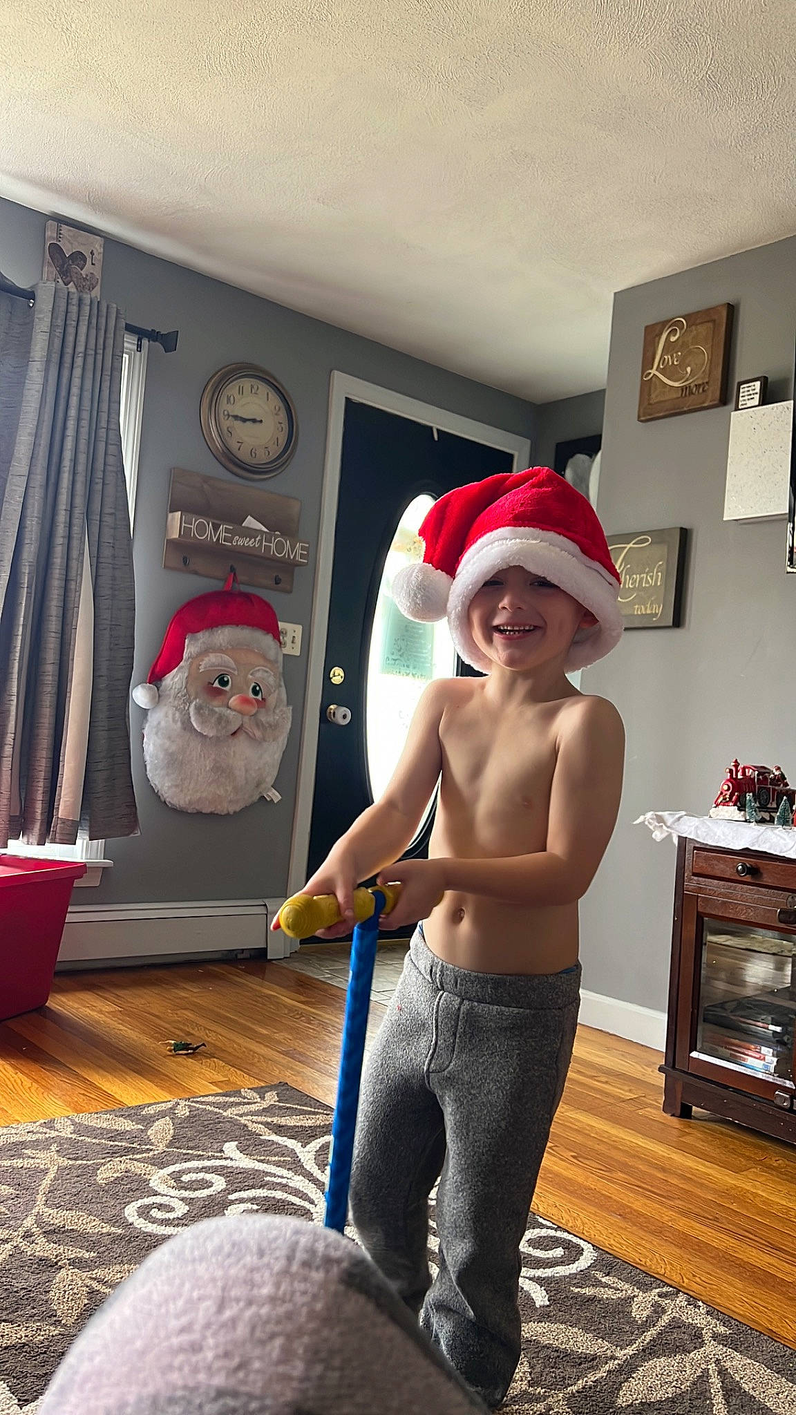 Cameron joined the competition — help win amazing prizes! barechested, chest, child, curtain, flooring, fun, happy, hat, headgear, headwear, houseplant, joy, person, picture_frame, room, shorts, smile, standing, t_shirt, toddler