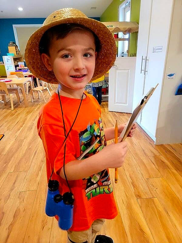 Cameron is registered to the contest to win money with this photo: child, fashion_accessory, flooring, fun, happy, hardwood, hat, headgear, joy, laminate_flooring, person, play, smile, standing, sun_hat, t_shirt, thumb, toddler, varnish, wood