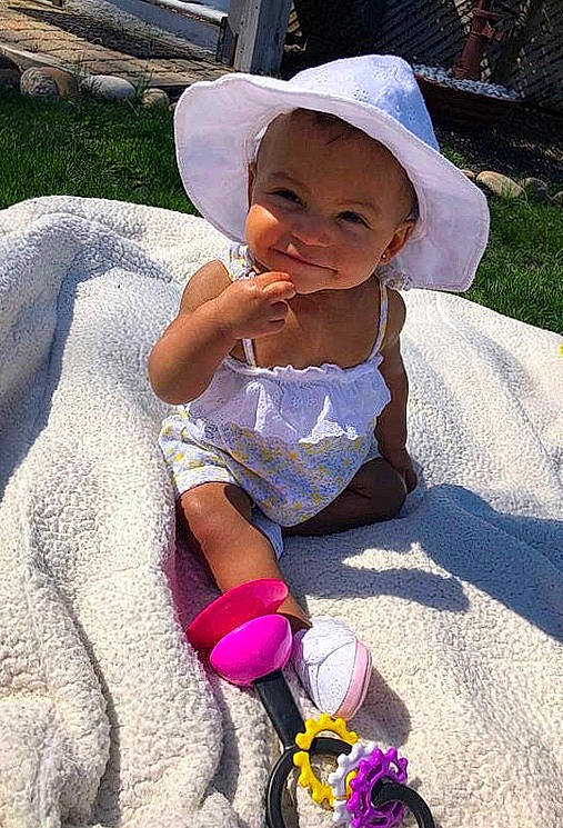 Jayde joined the competition — help win amazing prizes! child, flower, fun, headgear, joy, person, plant, play, smile, summer, sun_hat, toddler, tourism, vacation