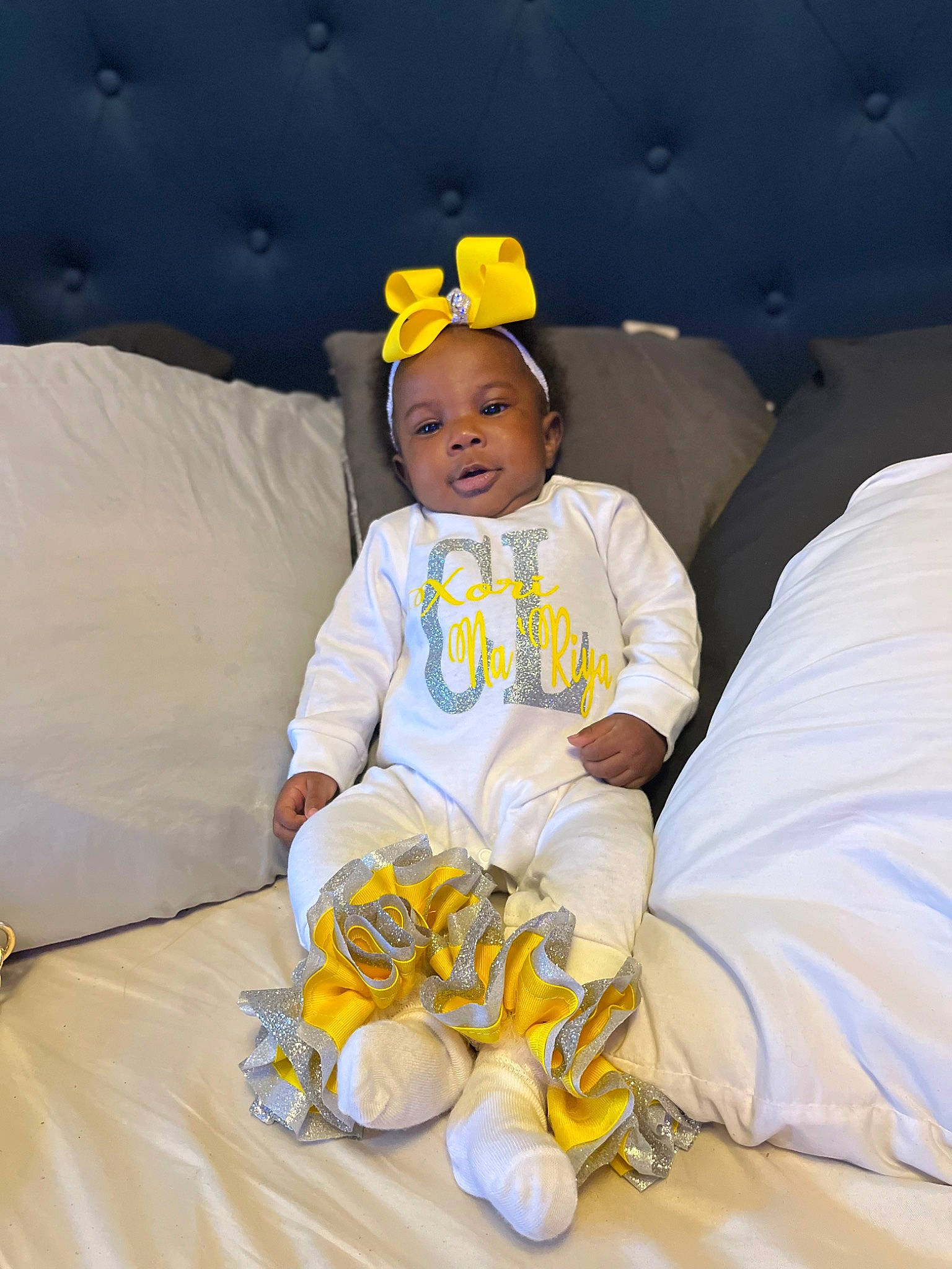 Xori joined the competition — help win amazing prizes! baby, baby_toddler_clothing, cap, child, comfort, costume_hat, couch, eye, fashion_accessory, fun, happy, hat, linens, person, room, sitting, sleeve, smile, t_shirt, textile