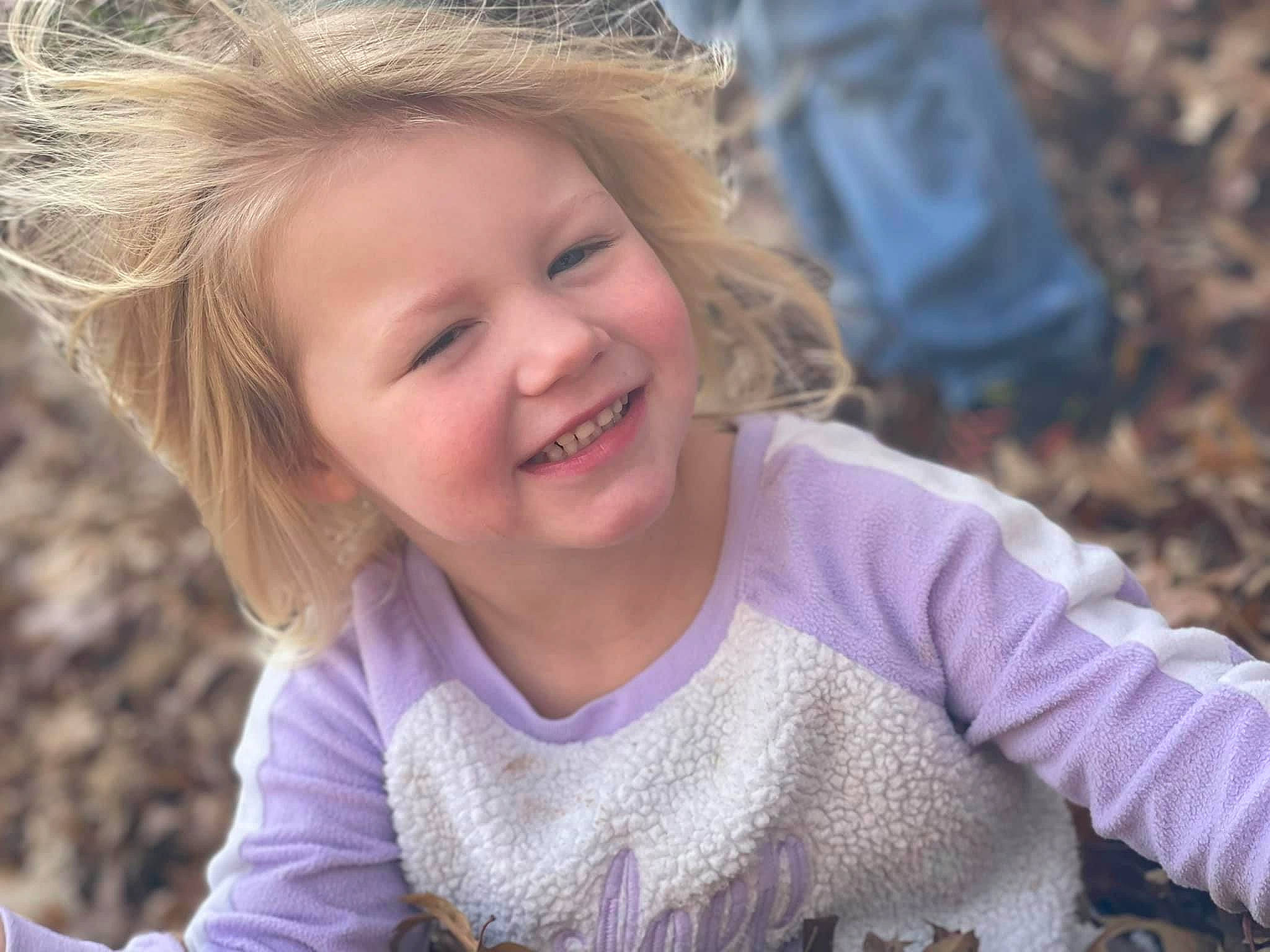 Serenity is registered to the contest to win money with this photo: arm, child, facial_expression, finger, fun, grass, grass_family, hair, happy, head, iris, joint, joy, leisure, lip, mammal, people_in_nature, person, skin, smile