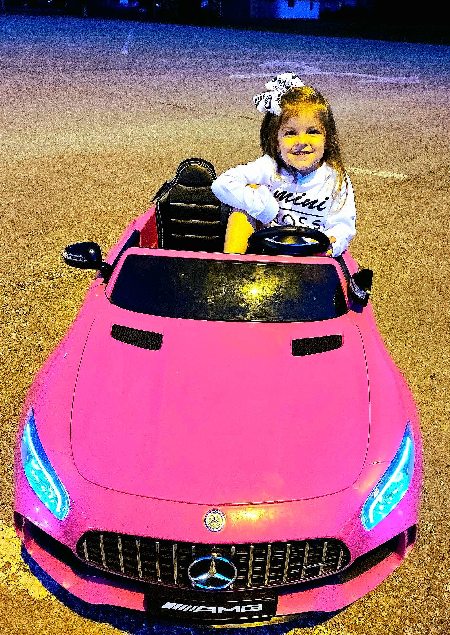 Lorelei joined the competition — help win amazing prizes! automotive_design, automotive_exterior, automotive_lighting, blue, bumper, car, green, grille, headlamp, hood, joy, light, motor_vehicle, person, personal_luxury_car, photograph, pink, red, smile, vehicle