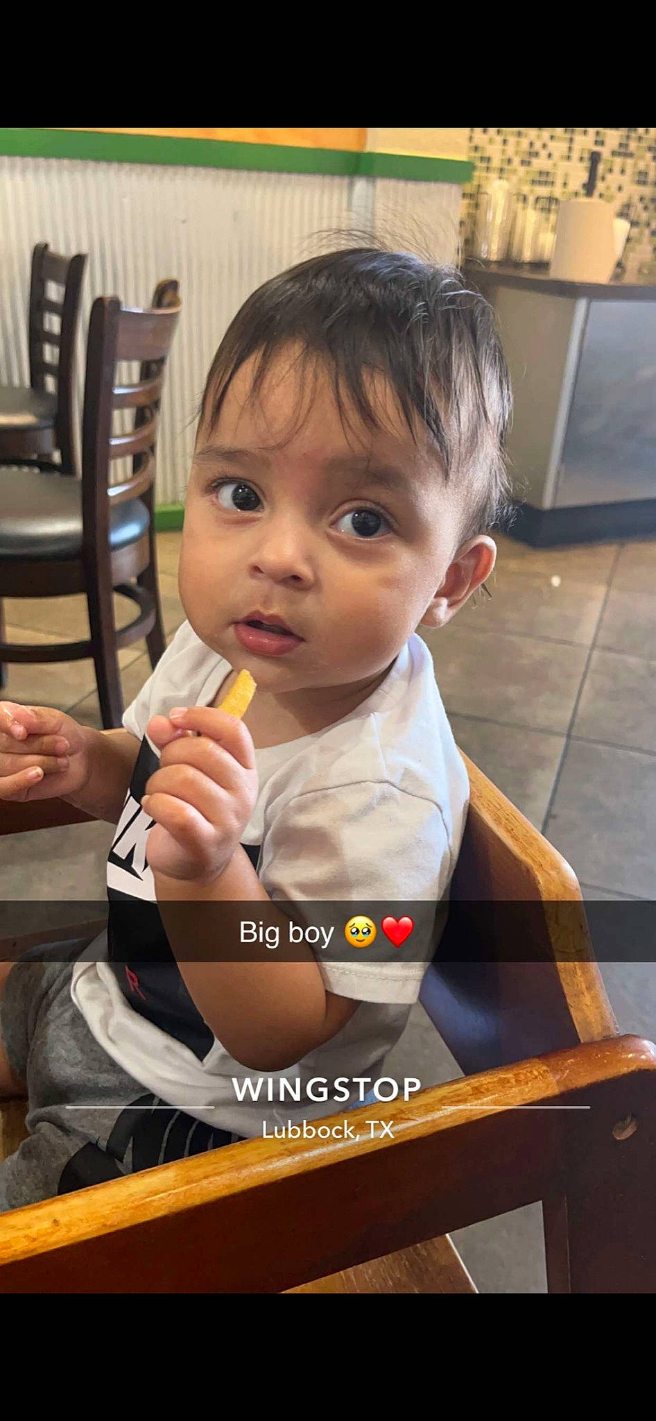 Dekari is registered to the contest to win money with this photo: baby, baby_toddler_clothing, chair, cheek, child, comfort_food, facial_expression, finger, flooring, fun, gesture, hand, happy, person, play, room, sitting, skin, thumb, toddler