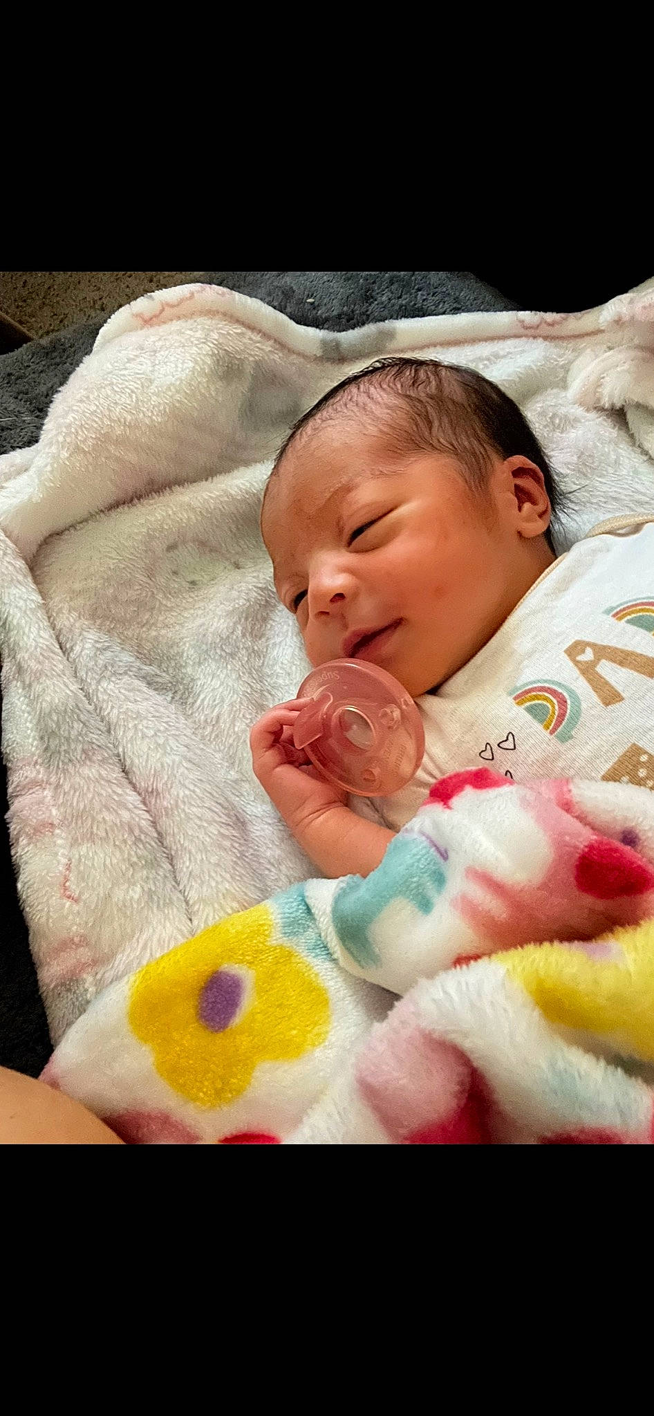 Delani is registered to the contest to win money with this photo: baby, baby_products, baby_sleeping, baby_toddler_clothing, bedding, bedtime, blanket, cheek, child, comfort, linens, nap, nose, person, pink, room, skin, sleep, sweetness, textile