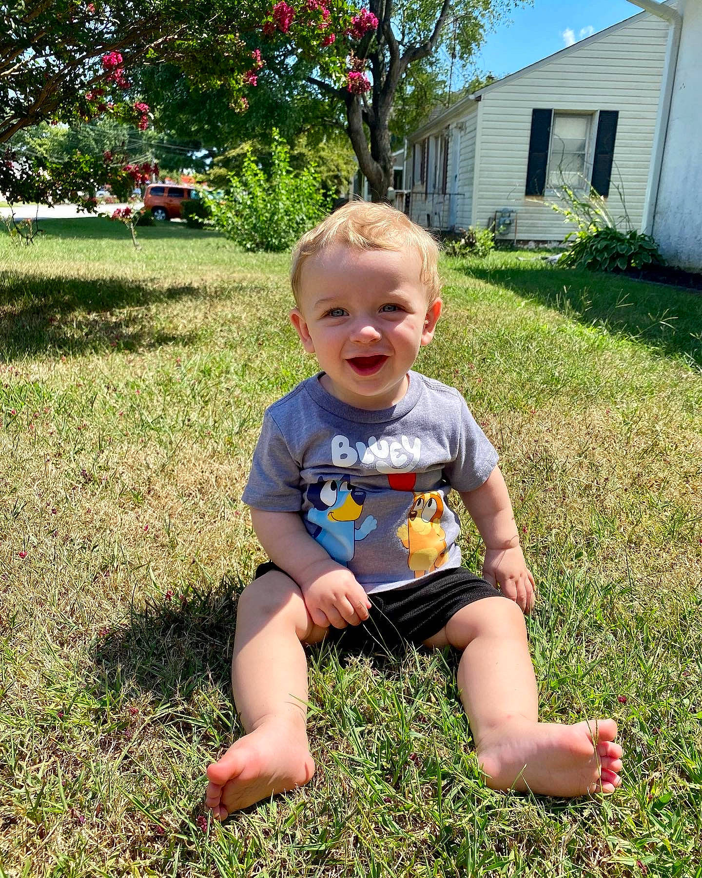 Maverick joined the competition — help win amazing prizes! baby, baby_toddler_clothing, barefoot, face, garden, grass, groundcover, happy, head, house, joy, lawn, leisure, people_in_nature, person, plant, smile, summer, t_shirt, toddler