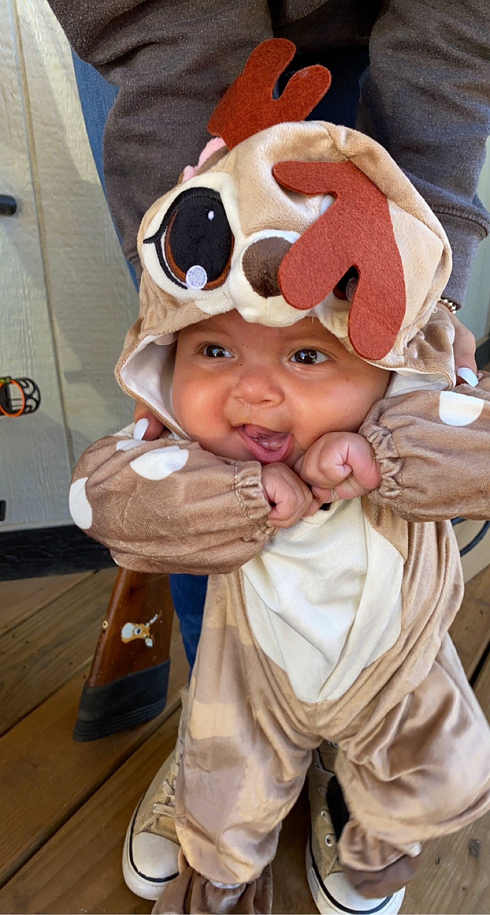 Corbyn is registered to the contest to win money with this photo: baby, baby_toddler_clothing, beanie, cap, cheek, child, costume, costume_hat, event, eye, fun, fur, gesture, glove, happy, hat, headwear, person, personal_protective_equipment, sitting