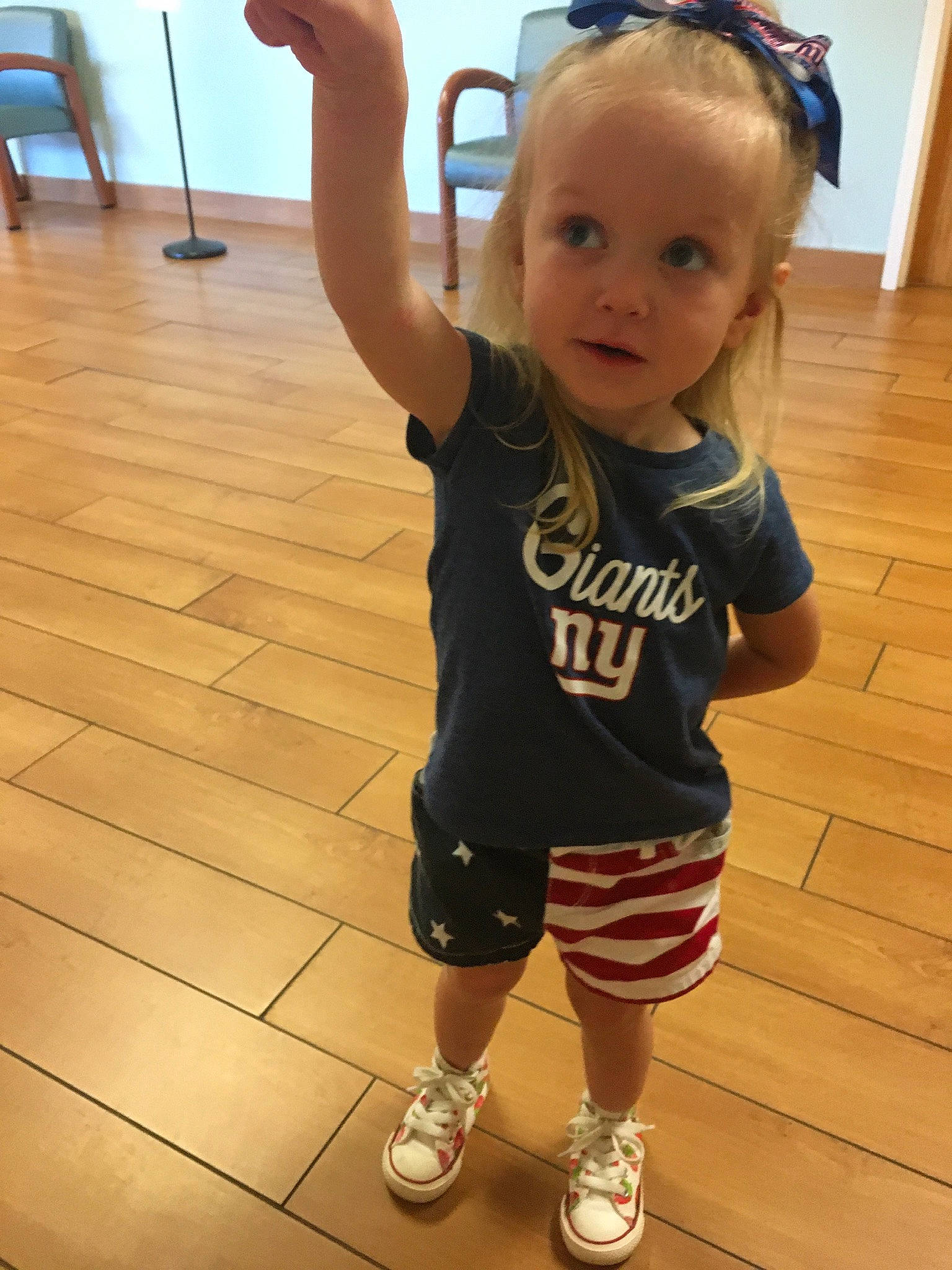 Mackenzie joined the competition — help win amazing prizes! arm, baby_toddler_clothing, child, face, floor, flooring, gesture, hair, hairstyle, happy, head, joint, leg, person, shoulder, skin, sleeve, standing, thigh, toddler