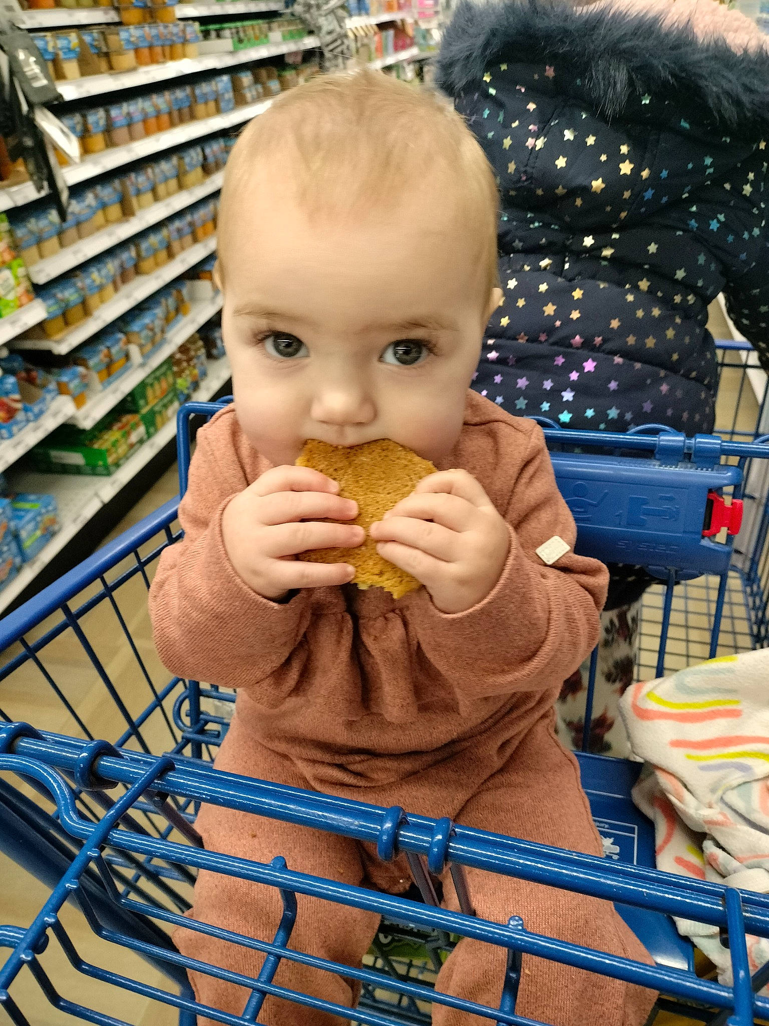 Dalia joined the competition — help win amazing prizes! biting, child, convenience_store, customer, event, food, fun, hand, junk_food, natural_foods, organ, person, photograph, play, product, retail, shelf, shelving, snapshot, sweet_corn