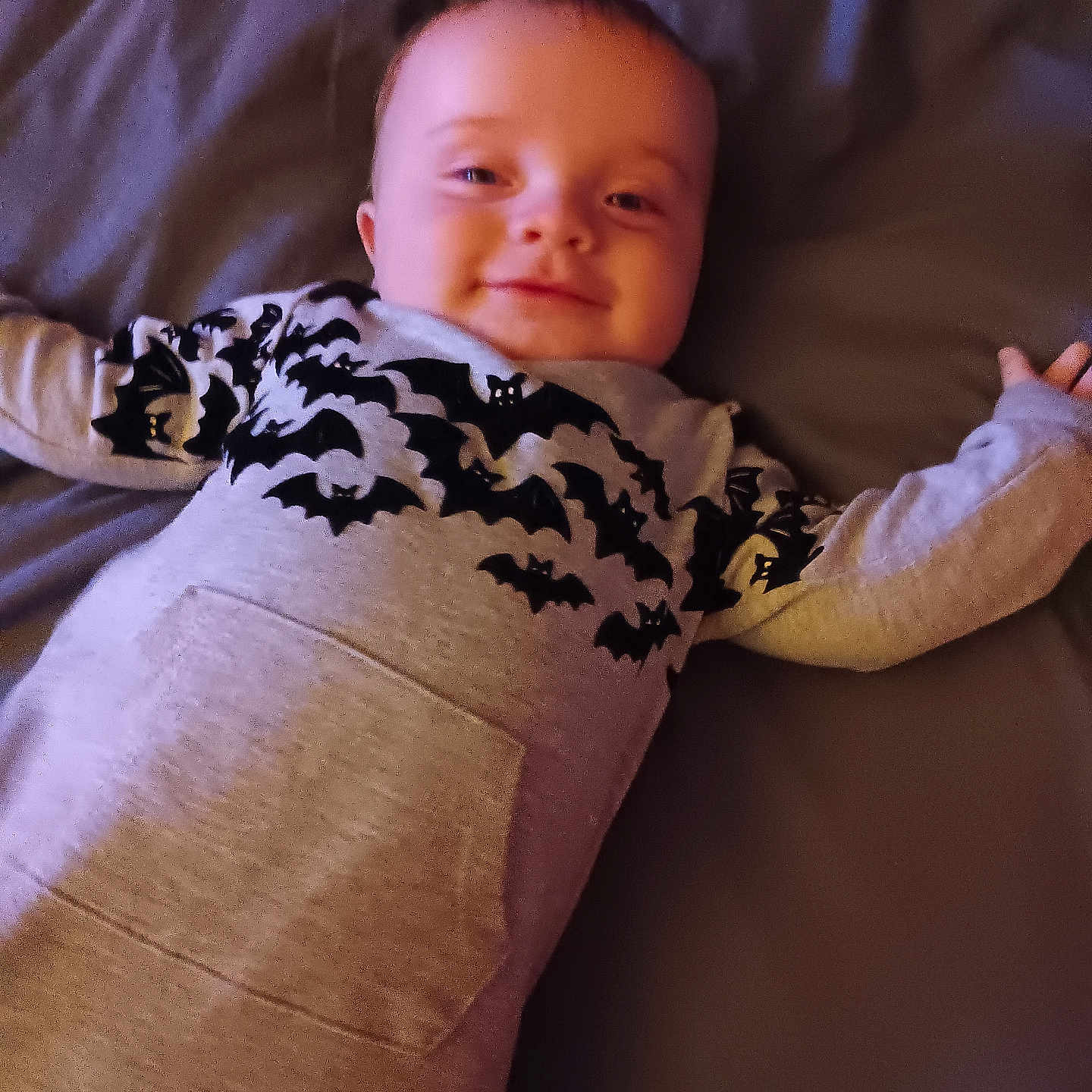 Ryan is registered to the contest to win money with this photo: applique, baby, blanket, bodypart, clothing, couch, cushion, face, finger, furniture, hand, head, homedecor, linen, longsleeve, newborn, person, photography, portrait, sleeve