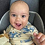 Joel joined the competition — help win amazing prizes! baby, infant, smiling, face, hand, plush_toy, seat, clothing, patterned_shirt, cushion, happy, cute, child, indoor, person, portrait, skin, expression, young, closeup