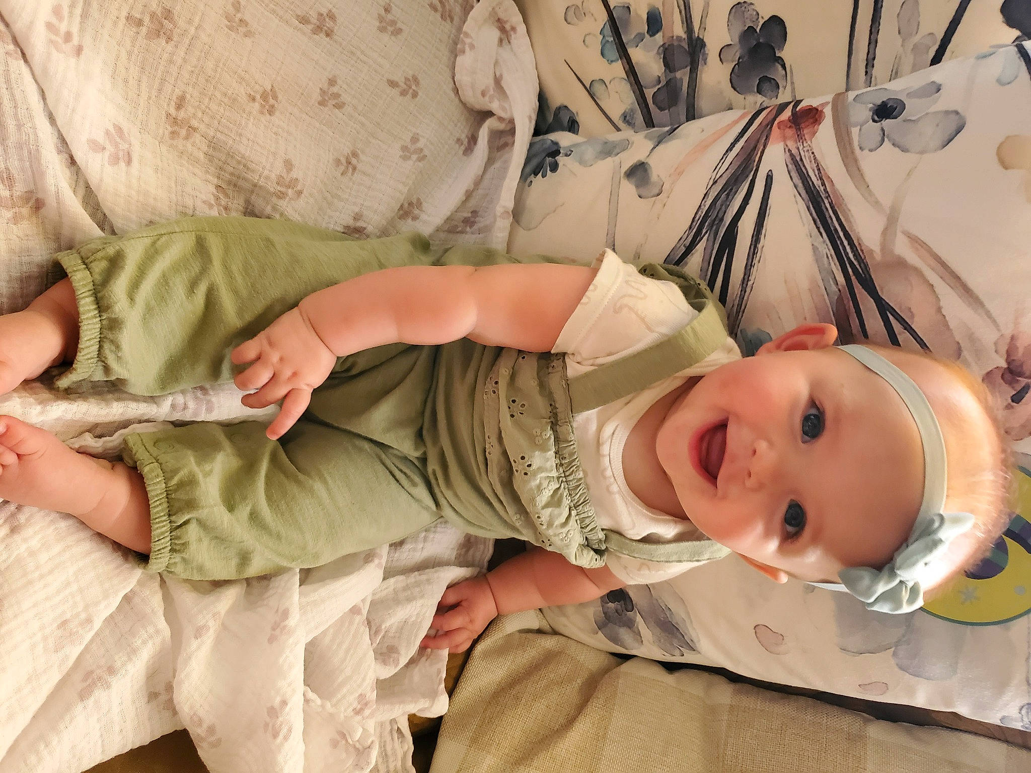 Hailey joined the competition — help win amazing prizes! arm, baby, baby_products, baby_toddler_clothing, bedding, bedtime, cheek, child, comfort, eye, human_body, joy, linens, pattern, person, room, skin, sleeve, smile, textile