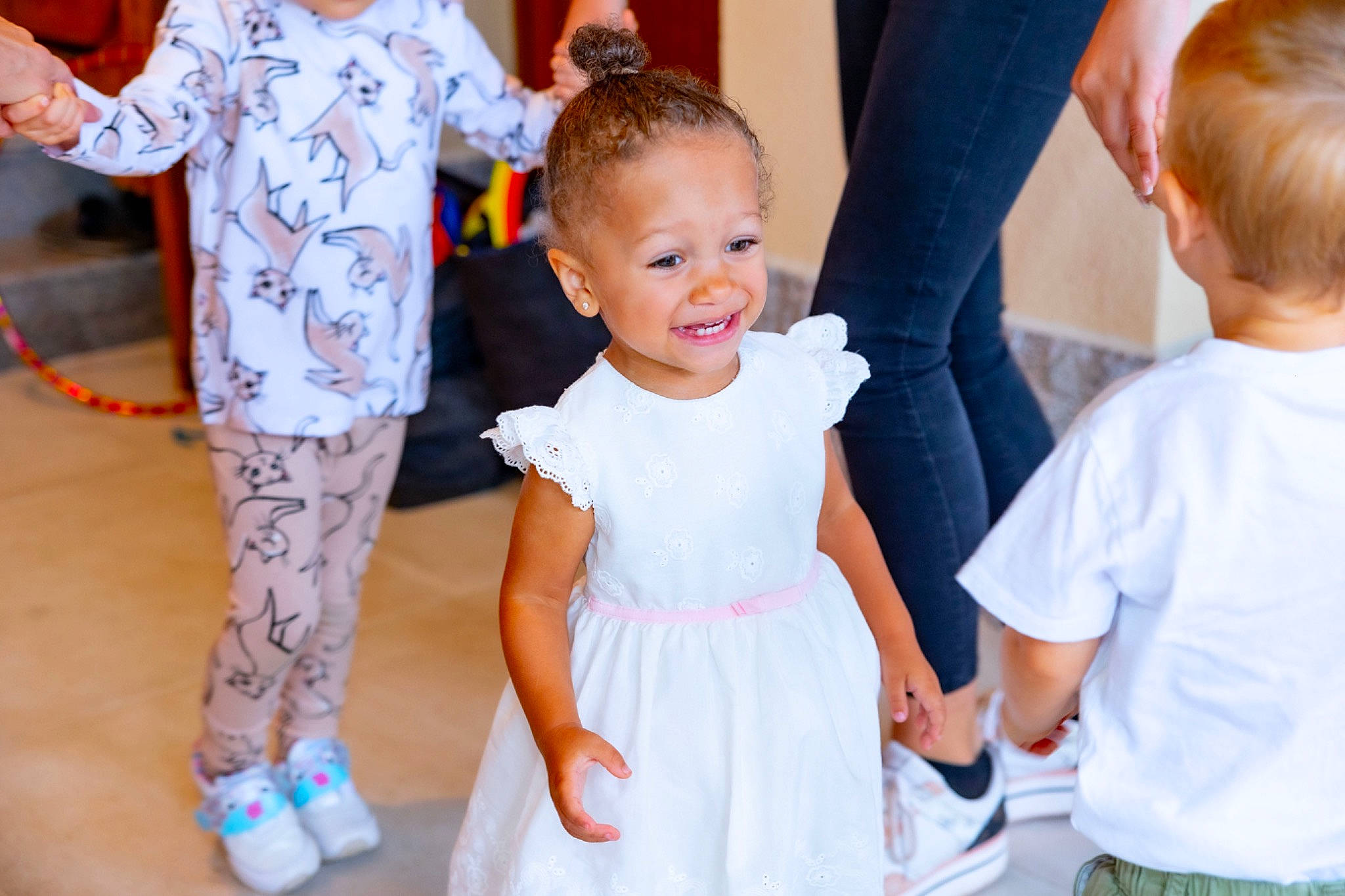 Stormi joined the competition — help win amazing prizes! arm, baby_toddler_clothing, child, day_dress, event, facial_expression, fun, gesture, hand, happy, interaction, joy, leisure, person, play, recreation, smile, standing, summer, t_shirt