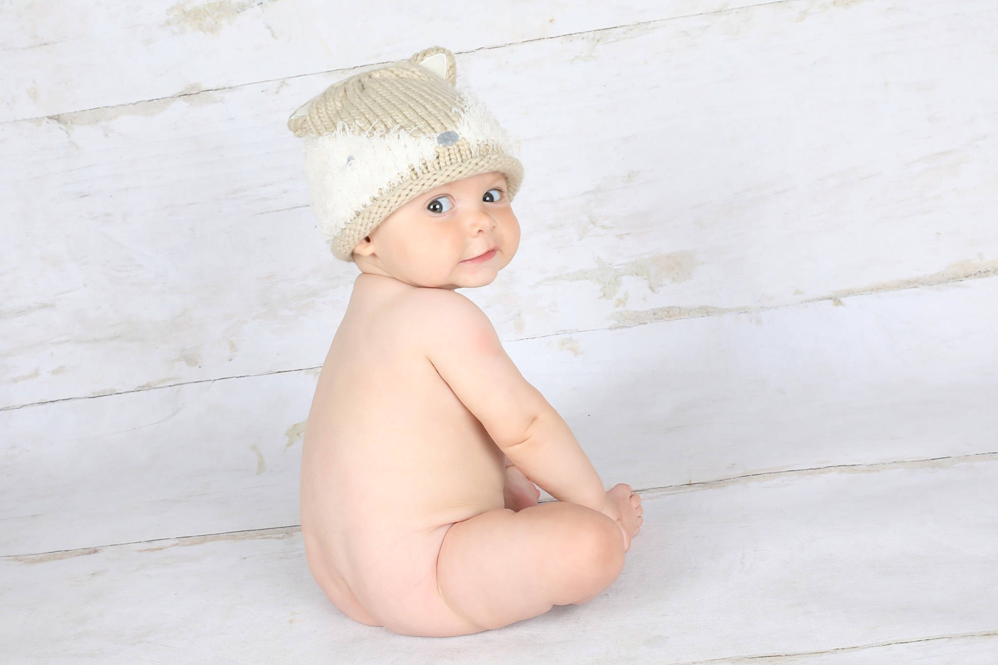 Hale joined the competition — help win amazing prizes! baby, beanie, cap, child, costume_hat, elbow, fashion_accessory, flash_photography, flooring, fur, hair_accessory, headgear, headpiece, headwear, knit_cap, person, skin, sleeve, smile, toddler