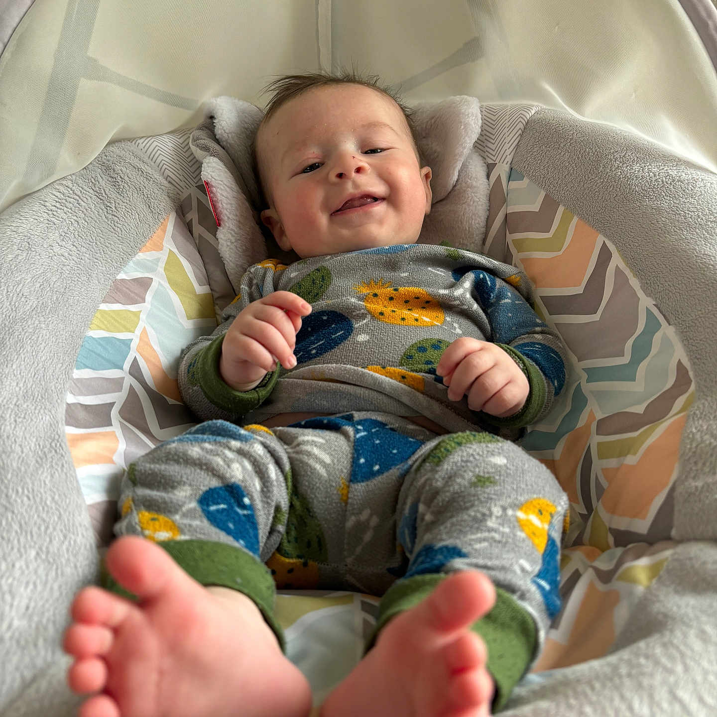 Caleb is registered to the contest to win money with this photo: baby, bed, blanket, bodypart, cradle, crib, face, finger, furniture, hand, happy, head, infantbed, newborn, person, photography, portrait, quilt, smile, toe