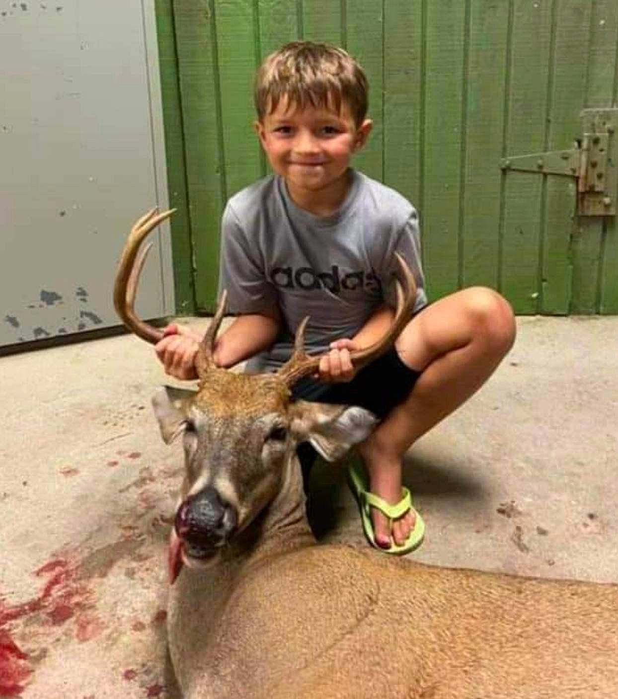 Tray joined the competition — help win amazing prizes! child, deer, fawn, fun, fur, goat, goats, hair, happy, horn, joy, livestock, person, play, recreation, shorts, smile, t_shirt, terrestrial_animal, toddler