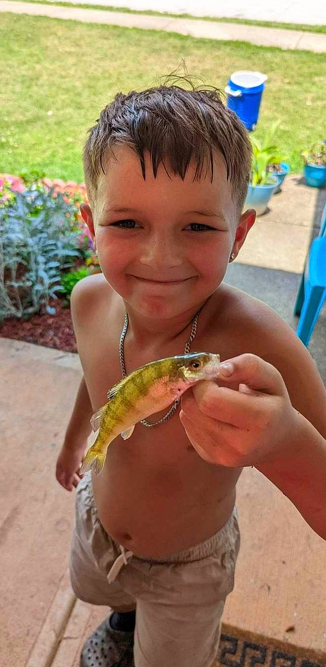 Tray joined the competition — help win amazing prizes! arthropod, beach, blue, child, decapoda, eye, fish, fun, hand, happy, joy, person, plant, reptile, seafood, smile, snake, soil, summer, terrestrial_animal