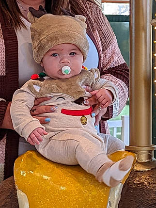 Colby joined the competition — help win amazing prizes! baby, baby_products, baby_sleeping, baby_toddler_clothing, cheek, child, comfort, costume, fictional_character, fun, fur, happy, headwear, lap, person, plush, room, sitting, stuffed_toy, toddler