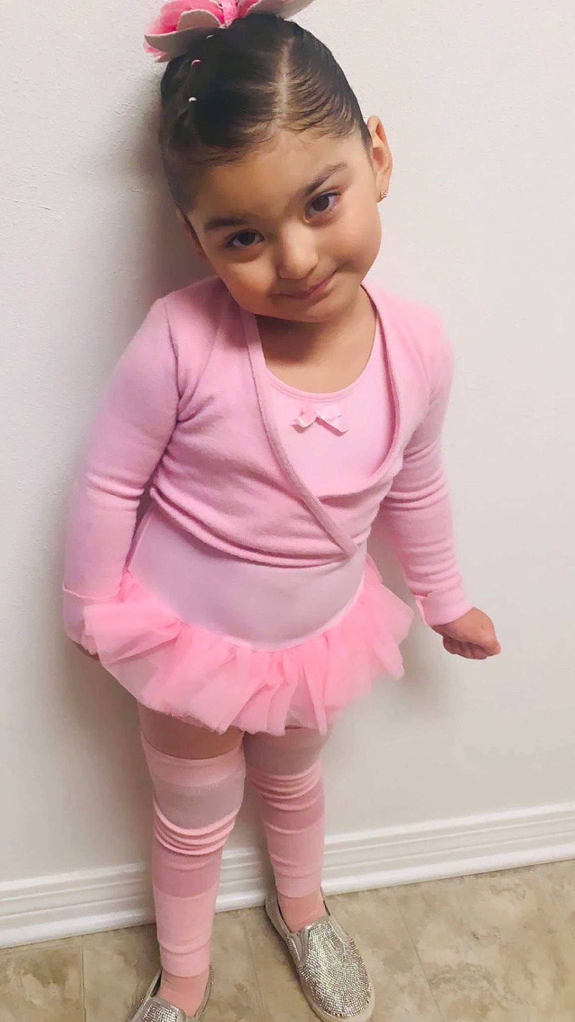 Elsie is registered to the contest to win money with this photo: baby_toddler_clothing, cheek, dress, face, hair, headgear, human_body, joy, knee, leg, neck, person, pink, purple, skin, sleeve, sock, t_shirt, thigh, toddler