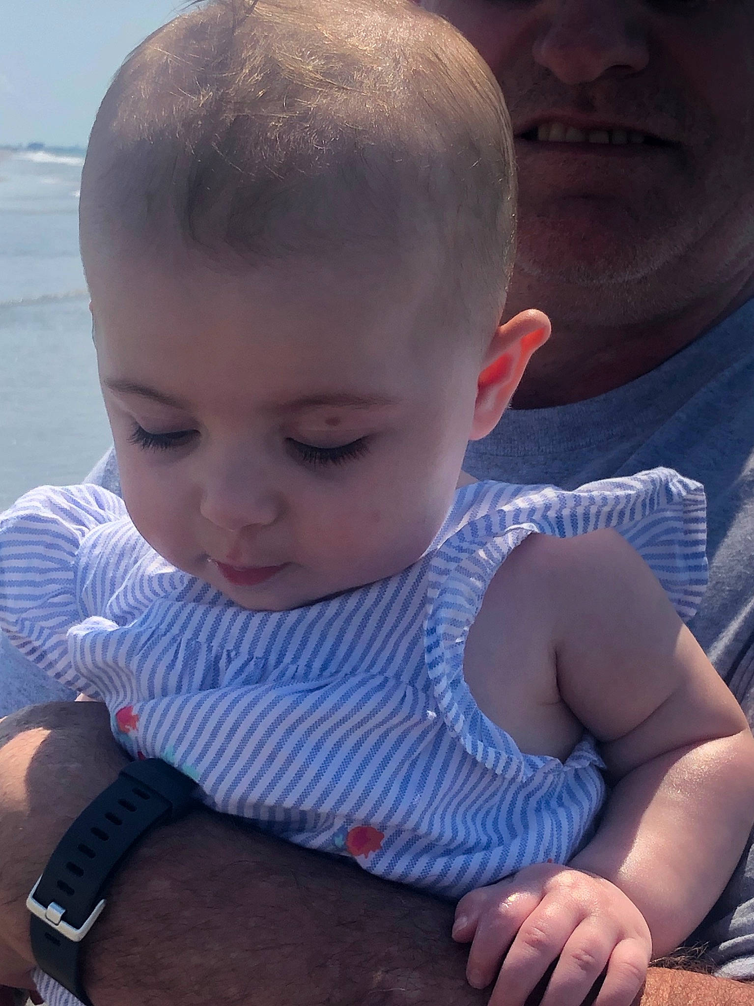 Carmen is registered to the contest to win money with this photo: arm, baby, cheek, child, chin, ear, eye, face, forehead, hand, head, lip, nose, person, sitting, skin, toddler