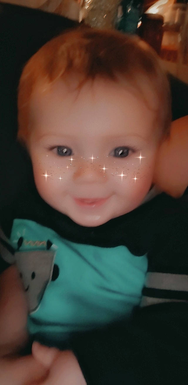 Samuel is registered to the contest to win money with this photo: arm, baby, baby_toddler_clothing, cheek, chin, ear, eyebrow, eyelash, forehead, human_body, iris, joint, lip, mouth, neck, nose, person, skin, sleeve, toddler