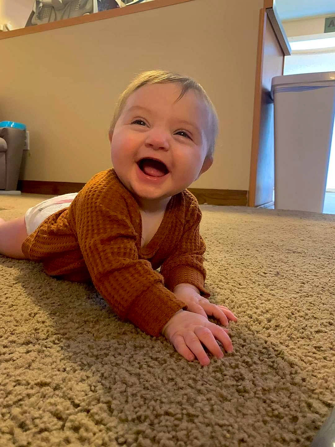 Tatum joined the competition — help win amazing prizes! baby, baby_laughing, baby_toddler_clothing, carpet, cheek, child, comfort, crawling, floor, flooring, fun, happy, hardwood, nose, person, room, skin, smile, standing, toddler