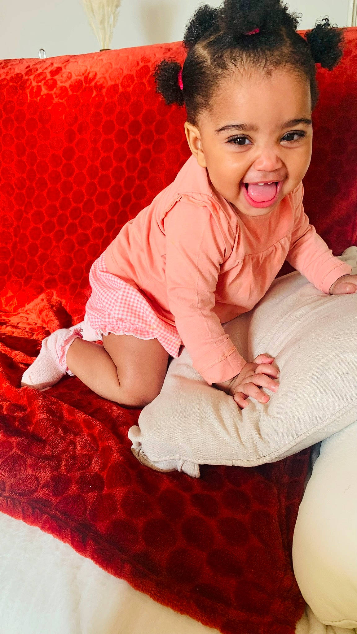 Trinity participe au concours pour gagner de l'argent avec cette photo : baby, baby_toddler_clothing, beauty, cheek, chin, comfort, dress, eye, flash_photography, flooring, hand, happy, head, person, pink, red, skin, sleeve, smile, thigh