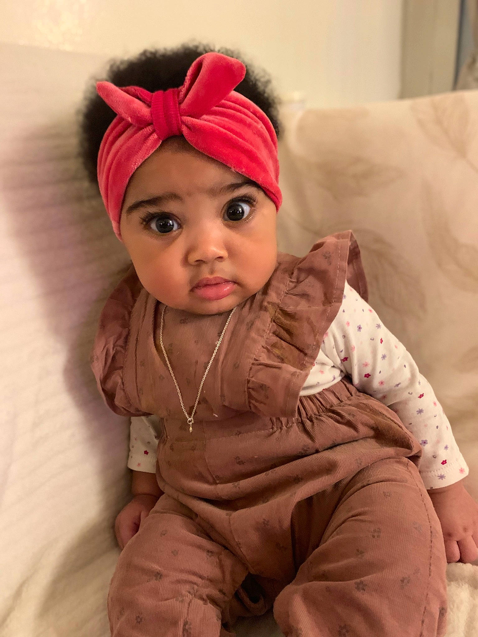 Trinity a rejoint le concours — aidez-le/la à gagner de superbes lots ! baby, baby_toddler_clothing, cap, comfort, eye, eyelash, face, fashion_accessory, flooring, fur, hairstyle, head, headgear, headwear, human_body, knit_cap, lip, person, pink, sleeve