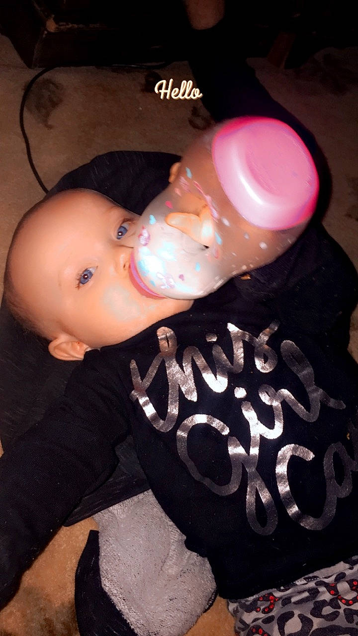 Gracie joined the competition — help win amazing prizes! baby_toddler_clothing, cheek, chin, cool, drinkware, eyebrow, eyelash, finger, flash_photography, gesture, hairstyle, human, lip, mouth, neck, nose, person, pink, plastic_bottle, skin