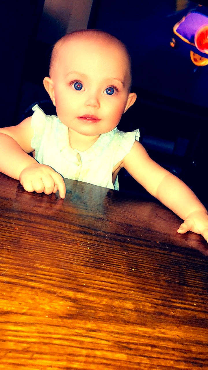 Gracie joined the competition — help win amazing prizes! baby, baby_toddler_clothing, cheek, child, finger, flash_photography, flooring, fun, hand, happy, hardwood, nail, nose, person, plank, skin, thumb, toddler, varnish, wood