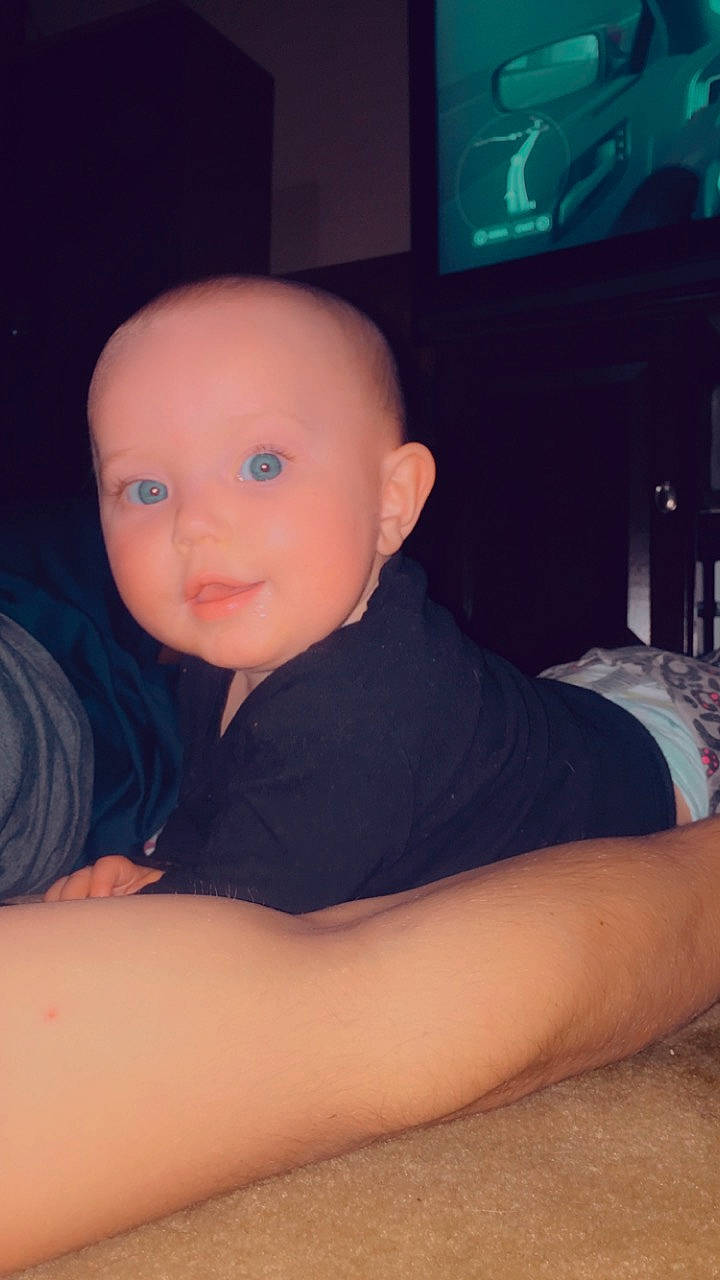 Gracie joined the competition — help win amazing prizes! abdomen, baby, black_hair, chest, chin, comfort, cool, elbow, eyebrow, flash_photography, flooring, knee, mouth, person, picture_frame, sleeve, smile, television, thigh, toddler