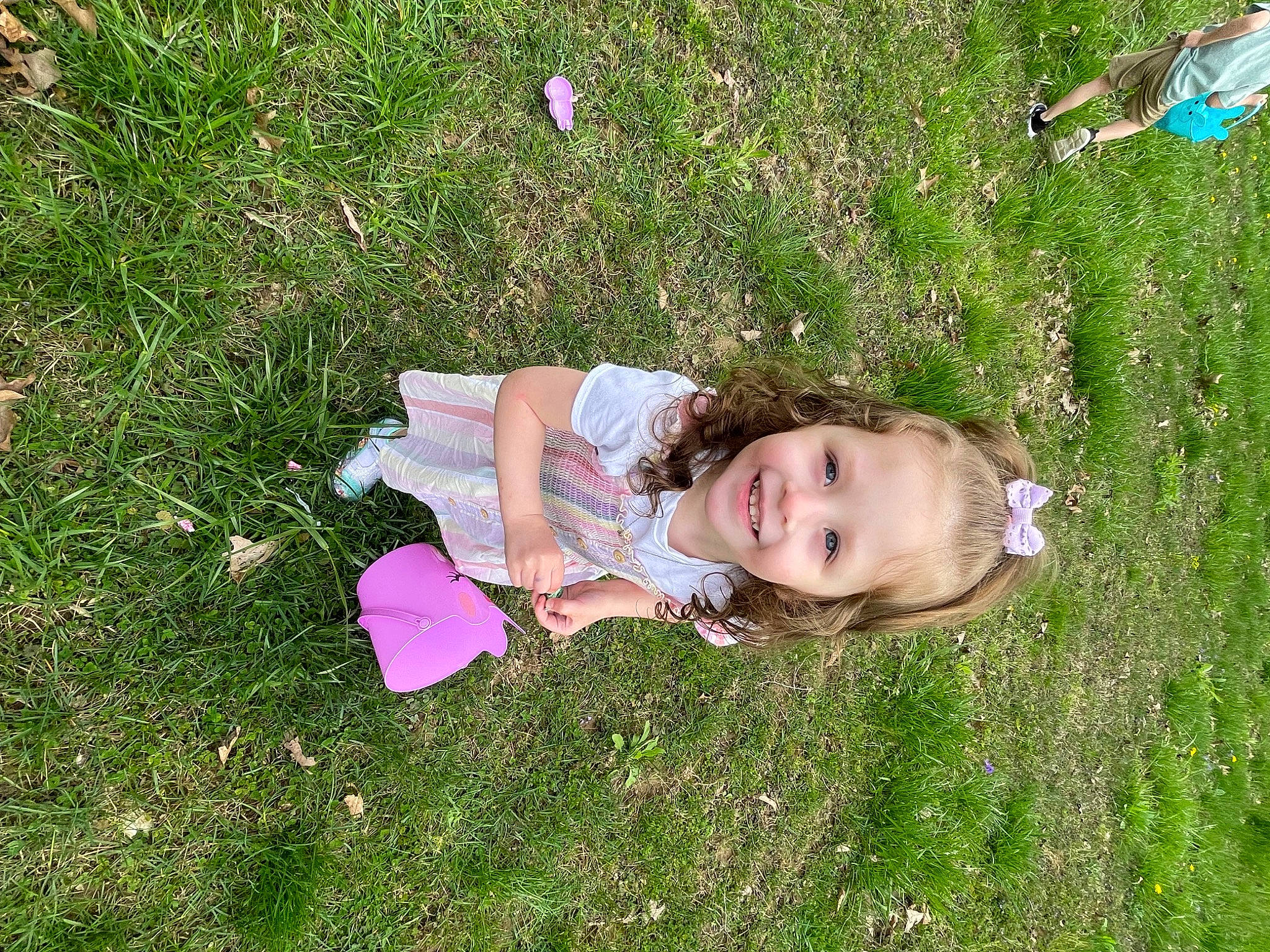 Violet is registered to the contest to win money with this photo: baby, baby_toddler_clothing, child, fun, garden, grass, grass_family, grassland, groundcover, happy, joy, lawn, leisure, meadow, natural_environment, people_in_nature, person, petal, plant, smile
