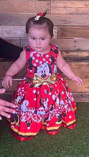 Daleyza joined the competition — help win amazing prizes! baby, baby_toddler_clothing, child, day_dress, dress, event, fashion_accessory, grass, happy, magenta, one_piece_garment, pattern, person, pink, purple, red, sitting, sleeve, toddler, waist