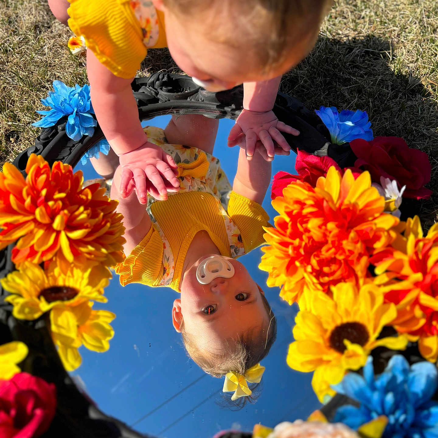 Bailey is registered to the contest to win money with this photo: baby, clothing, dahlia, daisy, dress, face, flower, flowerarrangement, flowerbouquet, grass, head, nature, outdoors, person, petal, photography, plant, portrait, rose, summer
