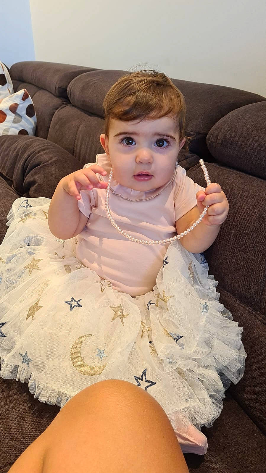 Catalina participe au concours pour gagner de l'argent avec cette photo : baby, baby_toddler_clothing, cheek, comfort, dress, embellishment, eye, gesture, hair, happy, head, human_body, iris, lip, mouth, neck, person, pink, shoulder, skin