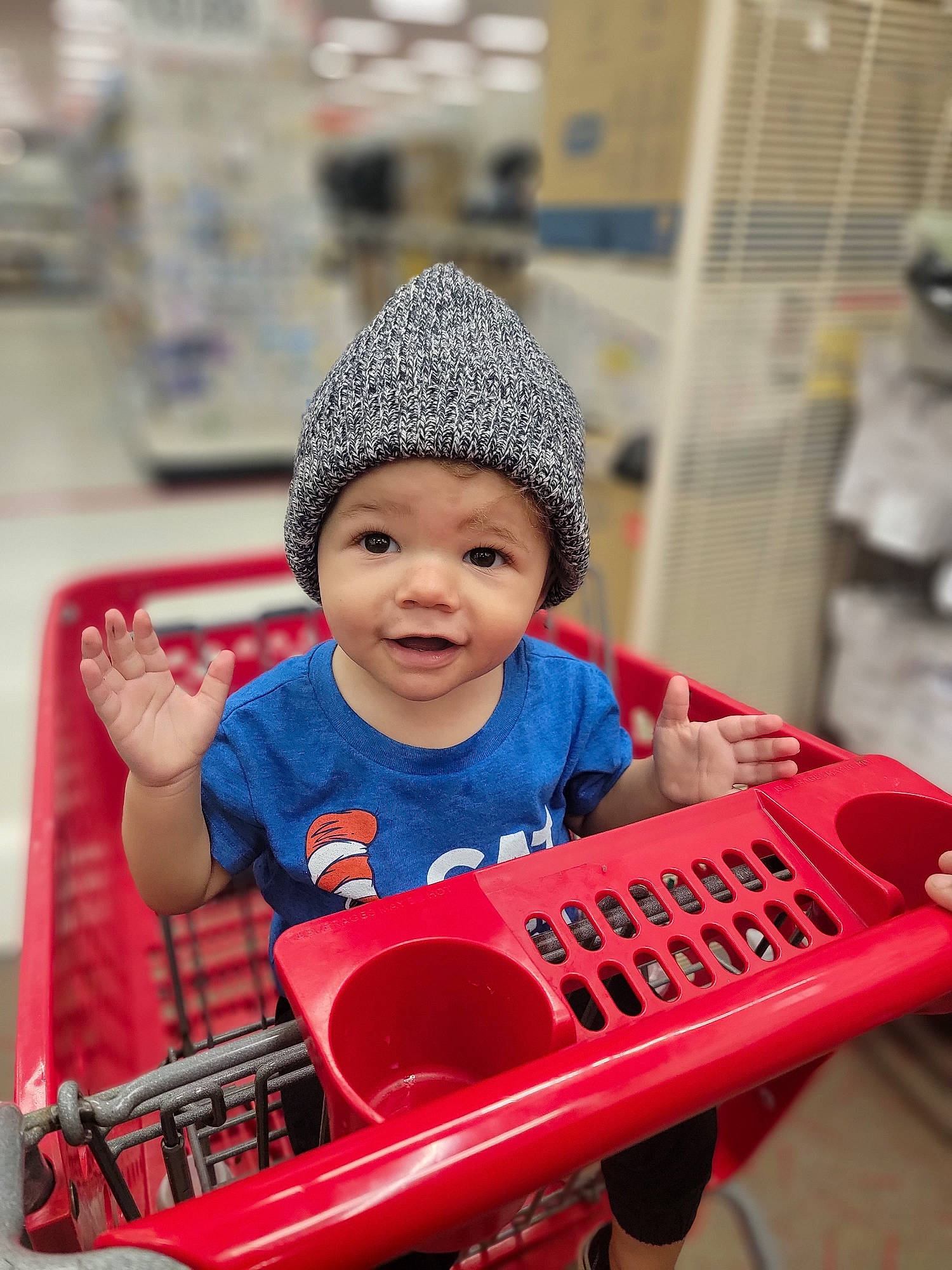 Lucas joined the competition — help win amazing prizes! baby, baby_toddler_clothing, cap, child, electric_blue, fun, happy, headgear, headwear, helmet, knit_cap, leisure, person, product, recreation, riding_toy, shopping_cart, sitting, smile, tire