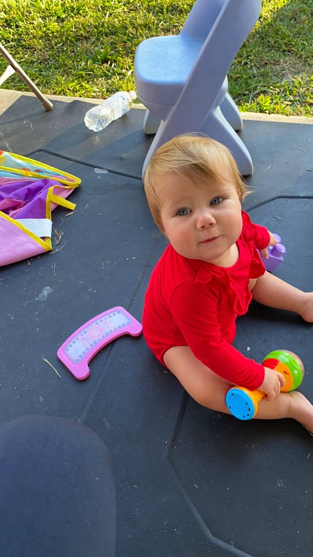 Adilynn joined the competition — help win amazing prizes! asphalt, baby, baby_playing_with_toys, baby_products, baby_toddler_clothing, child, electric_blue, fun, grass, green, happy, human_leg, leisure, person, pink, play, recreation, sitting, thigh, toddler