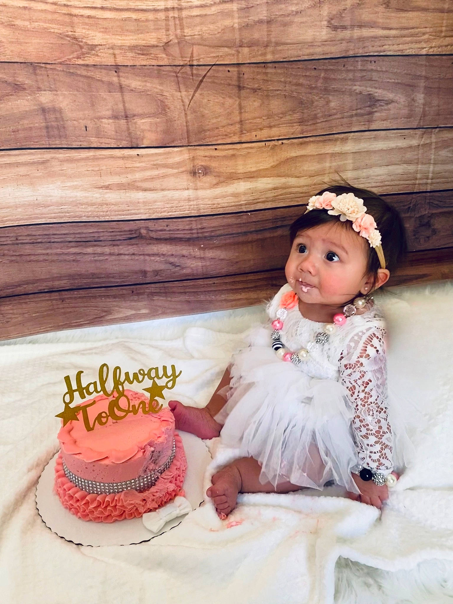 Olivia joined the competition — help win amazing prizes! baby_toddler_clothing, baked_goods, birthday_cake, cake, cake_decorating, child, embellishment, event, fashion_accessory, food, happy, hat, headpiece, headwear, peach, person, pink, sugar_cake, sweetness, textile