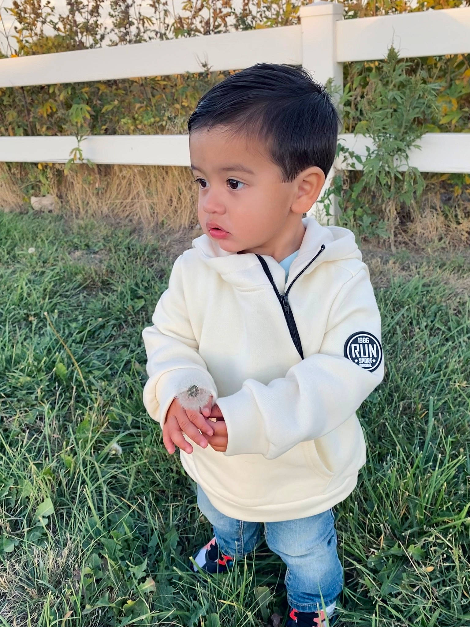 Marcel joined the competition — help win amazing prizes! baby, baby_toddler_clothing, child, dress_shirt, garden, grass, grass_family, grassland, happy, lawn, outerwear, pattern, people_in_nature, person, plant, sitting, sleeve, soil, toddler, yard