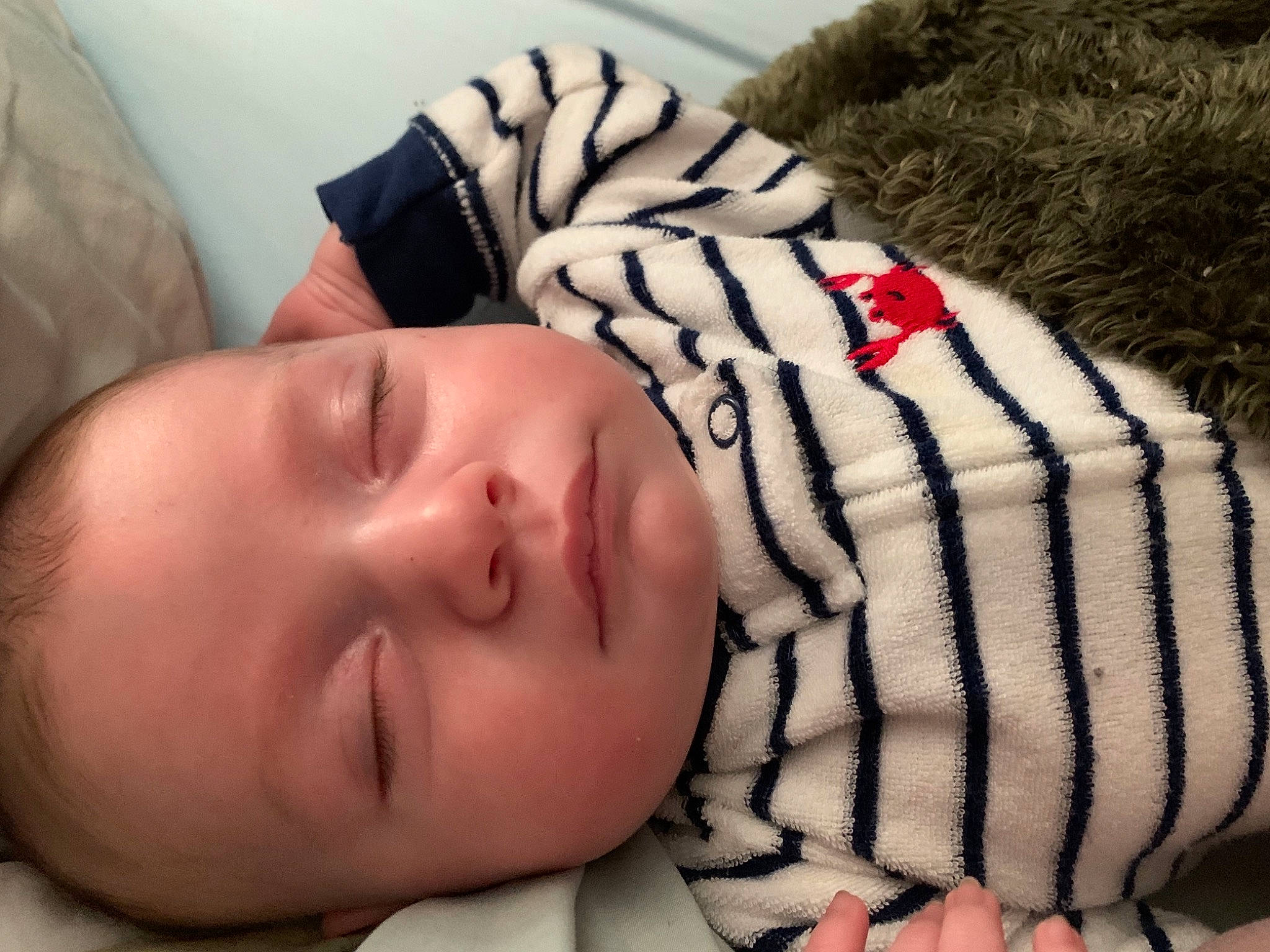 Bennett joined the competition — help win amazing prizes! arm, baby, baby_toddler_clothing, cheek, child, comfort, eye, eyelash, facial_expression, finger, grass, hand, human_body, lip, nose, pattern, person, product, skin, toddler