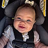 Ahmayah is registered to the contest to win money with this photo: baby, bow, car_seat, child, child_safety, closeup, clothing, cute, face, happy, head_support, indoor, infant, infant_girl, person, portrait, safety_harness, seatbelt, smile, straps