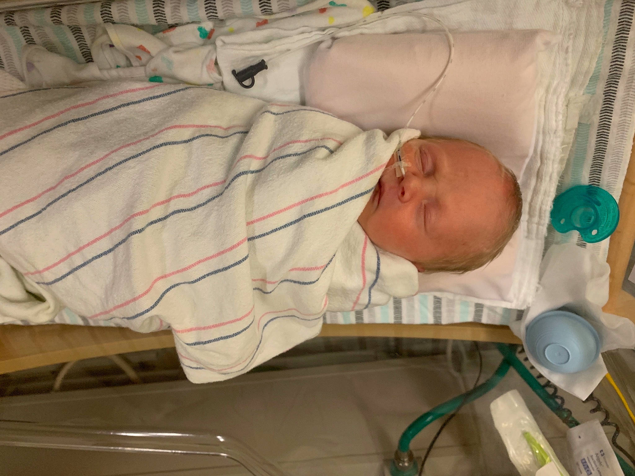 Brenden is registered to the contest to win money with this photo: baby, baby_products, baby_safety, bed, bedding, child, childbirth, comfort, head, health_care, hospital, infant_bed, linens, mechanical_fan, medical, medical_equipment, nap, person, room, service