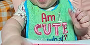 Alruna joined the competition — help win amazing prizes! baby, bib, cake, crumbs, feeding, highchair, messy, smiling, happy, face, hand, food, indoor, child, cute, pink, green, clothing, table, celebration