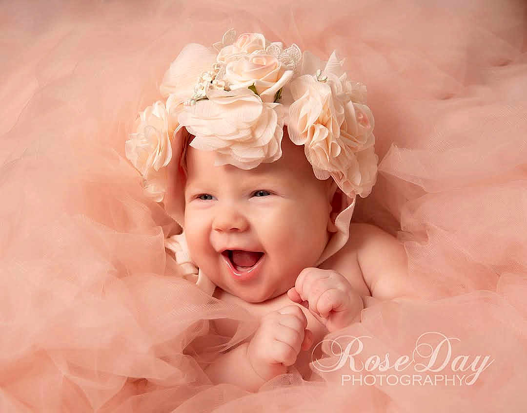Alruna joined the competition — help win amazing prizes! baby, smiling, flower_crown, pink, tulle, portrait, cute, infant, happy, soft_light, closeup, headwear, child, skin, face, hands, photography, adorable, newborn, studio