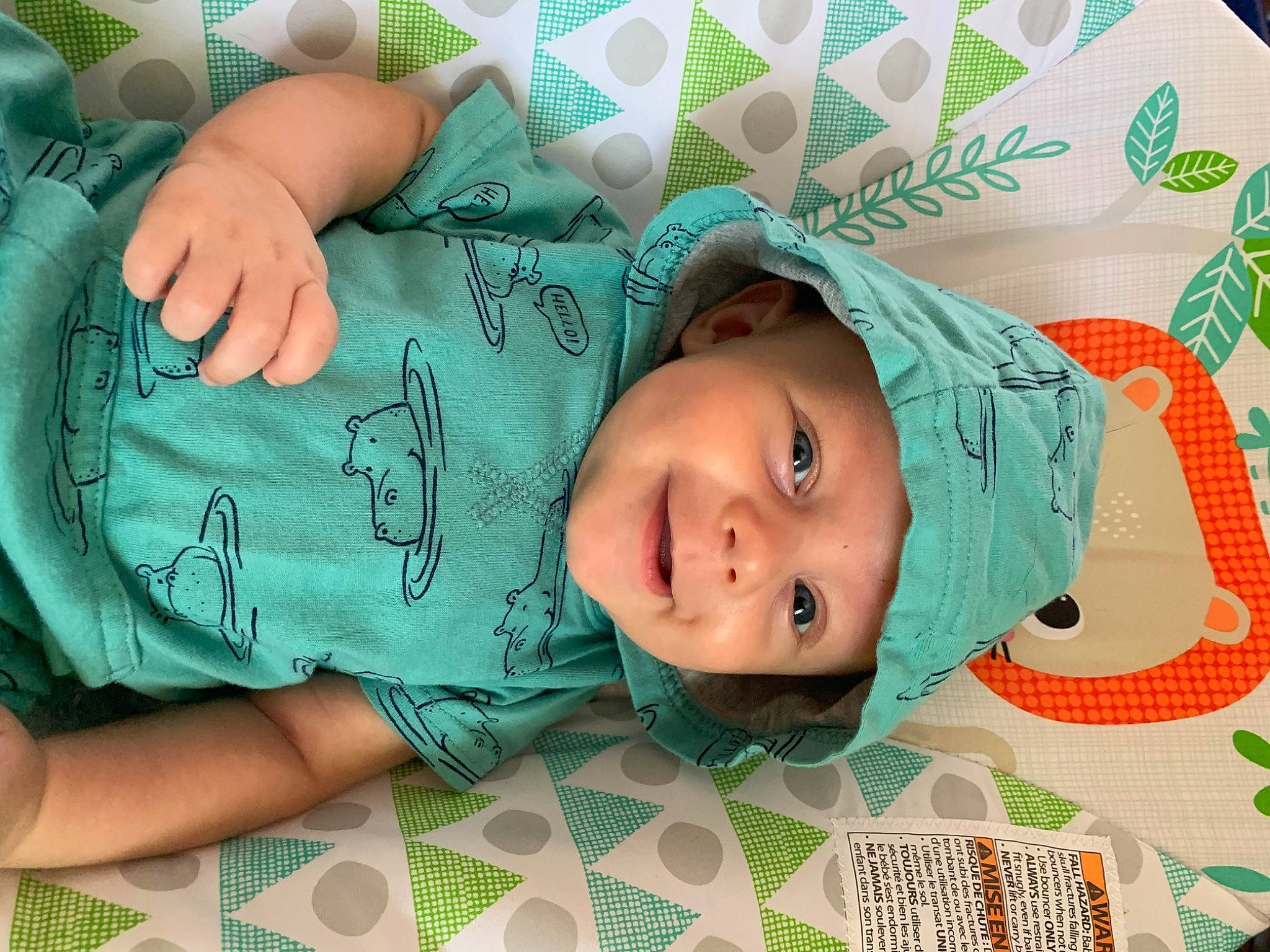 Kenton is registered to the contest to win money with this photo: baby, baby_sleeping, cheek, child, forehead, green, hand, happy, head, headgear, headwear, joy, nose, person, room, skin, toddler