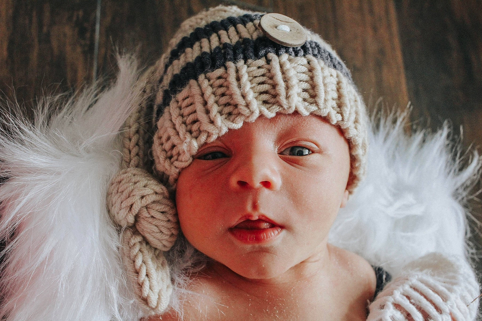 Kenton is registered to the contest to win money with this photo: baby, beanie, bonnet, cap, cheek, child, crochet, face, fashion_accessory, fur, hat, head, headgear, headwear, knit_cap, lip, nose, person, photography, portrait_photography
